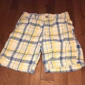 Plaid shorts.